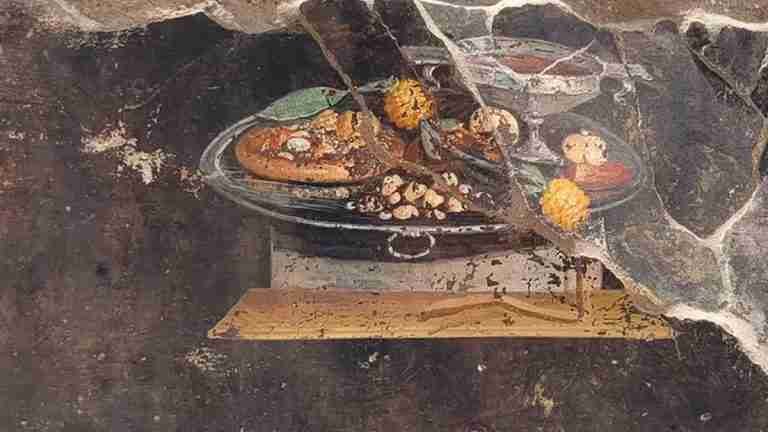 Descubren antigua pintura que podría ser el precursor de la pizza en Pompeya